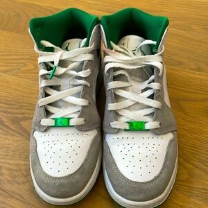 These are used shoe size 6 youth colors are green and white and grey.